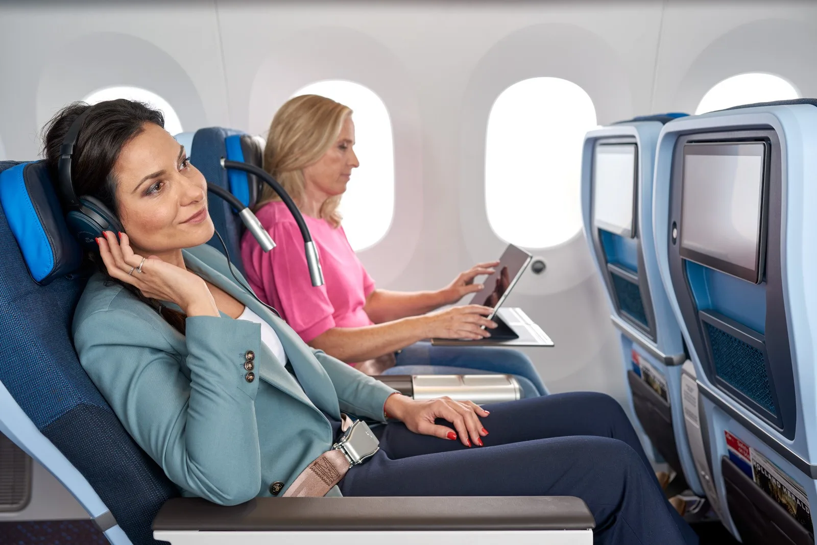 KLM cabin interior, family and small-group itineraries where pooled Flying Blue miles win.