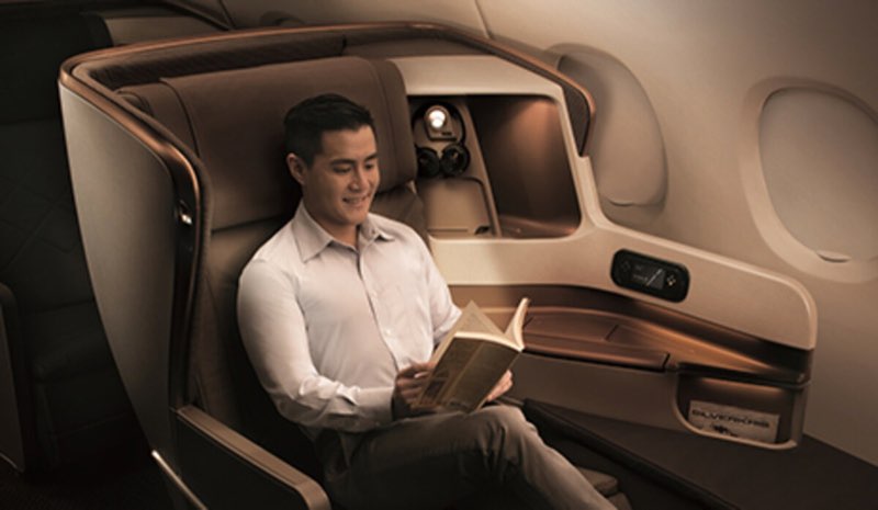 Singapore Airlines premium cabin interior with modern seating